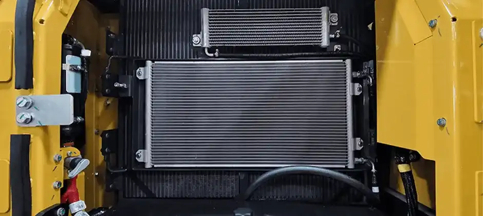 A bulldozer pointed out the locations of the radiator and coolingfan in his engine and displayed them with small ICONS